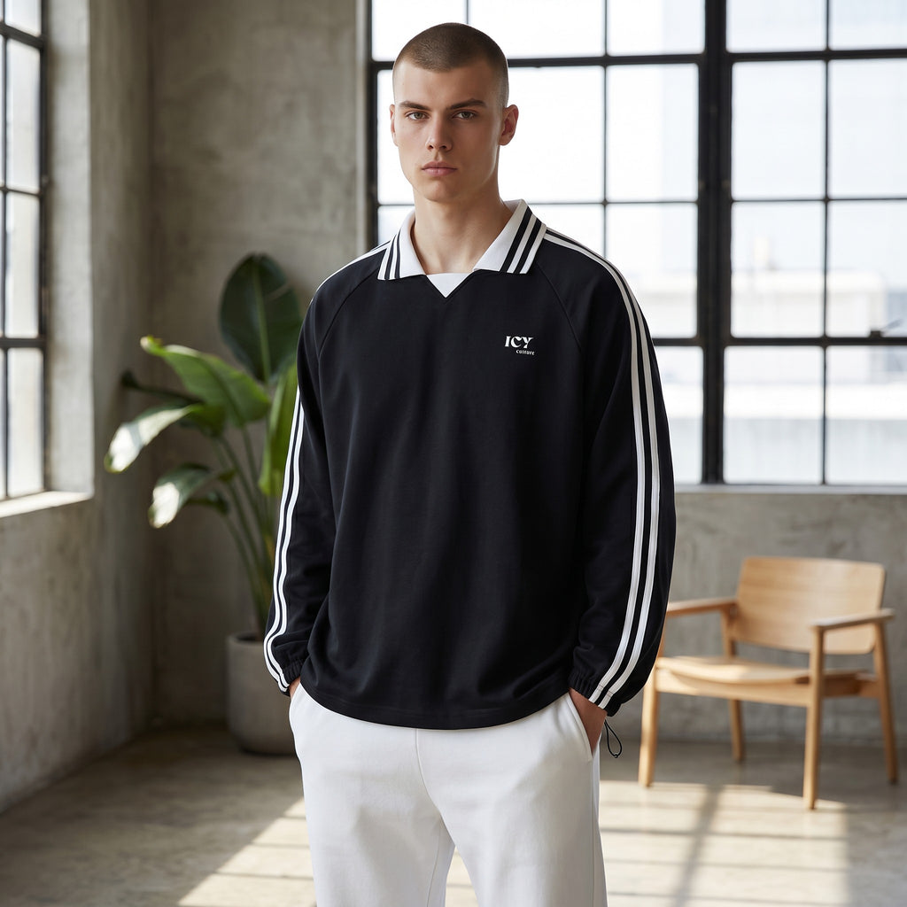 Icy Culture black 100% cotton jersey with white stripe raglan sleeves and a lapel collar.