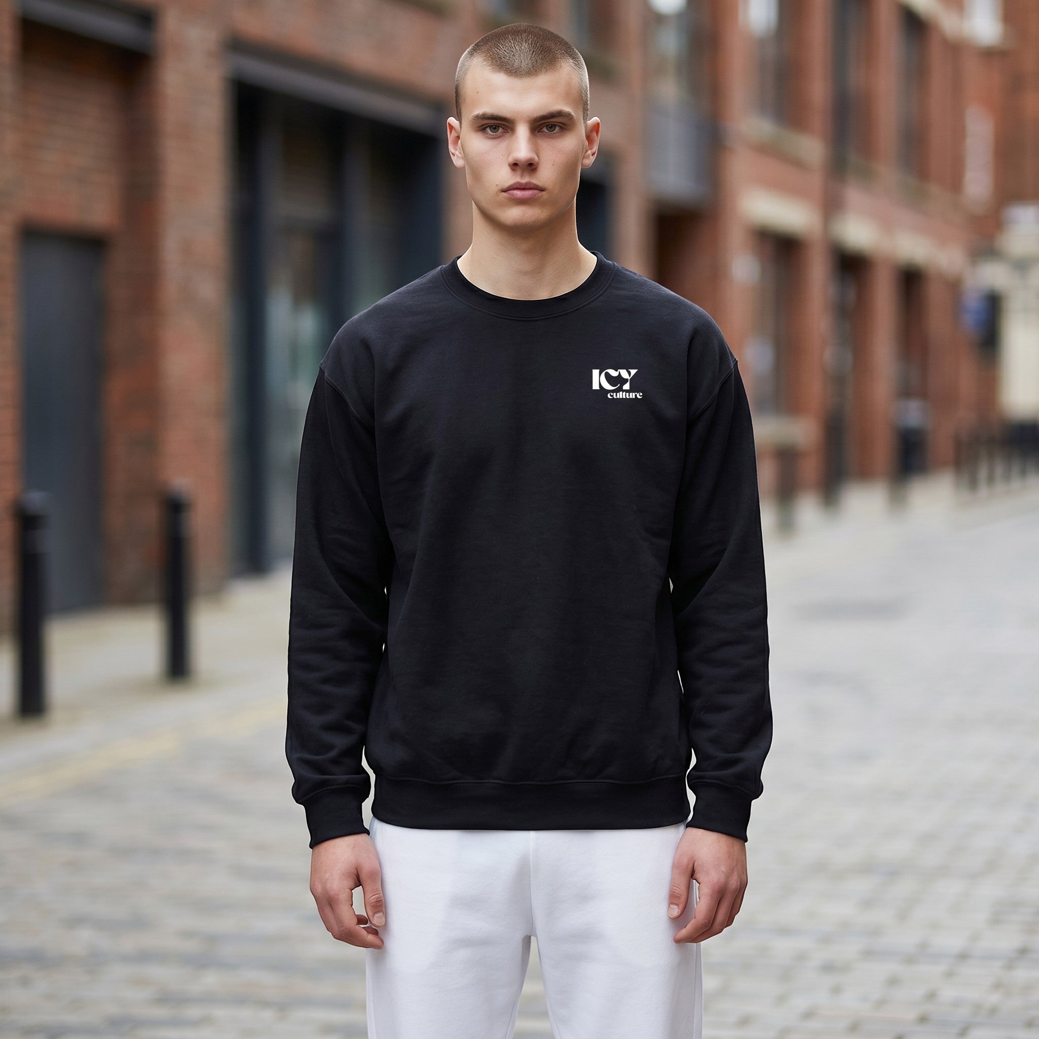 Icy Culture black crewneck sweatshirt with white logo on chest. 50% cotton, 50% polyester.