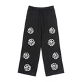 Icy Culture black fleece pants with repeating white logo print, drawstring waist, loose fit.