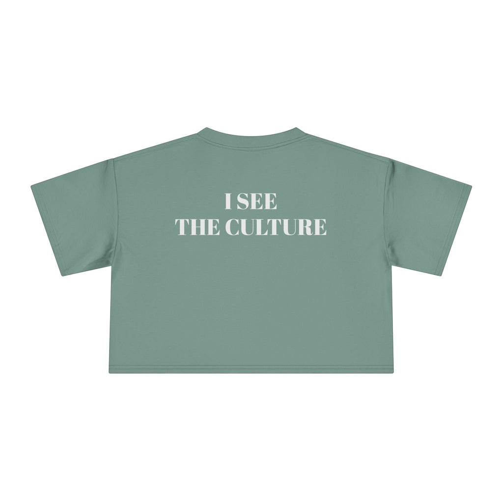 Icy Culture cropped tee in sage green, 100% cotton, with "I SEE THE CULTURE" text on the back.
