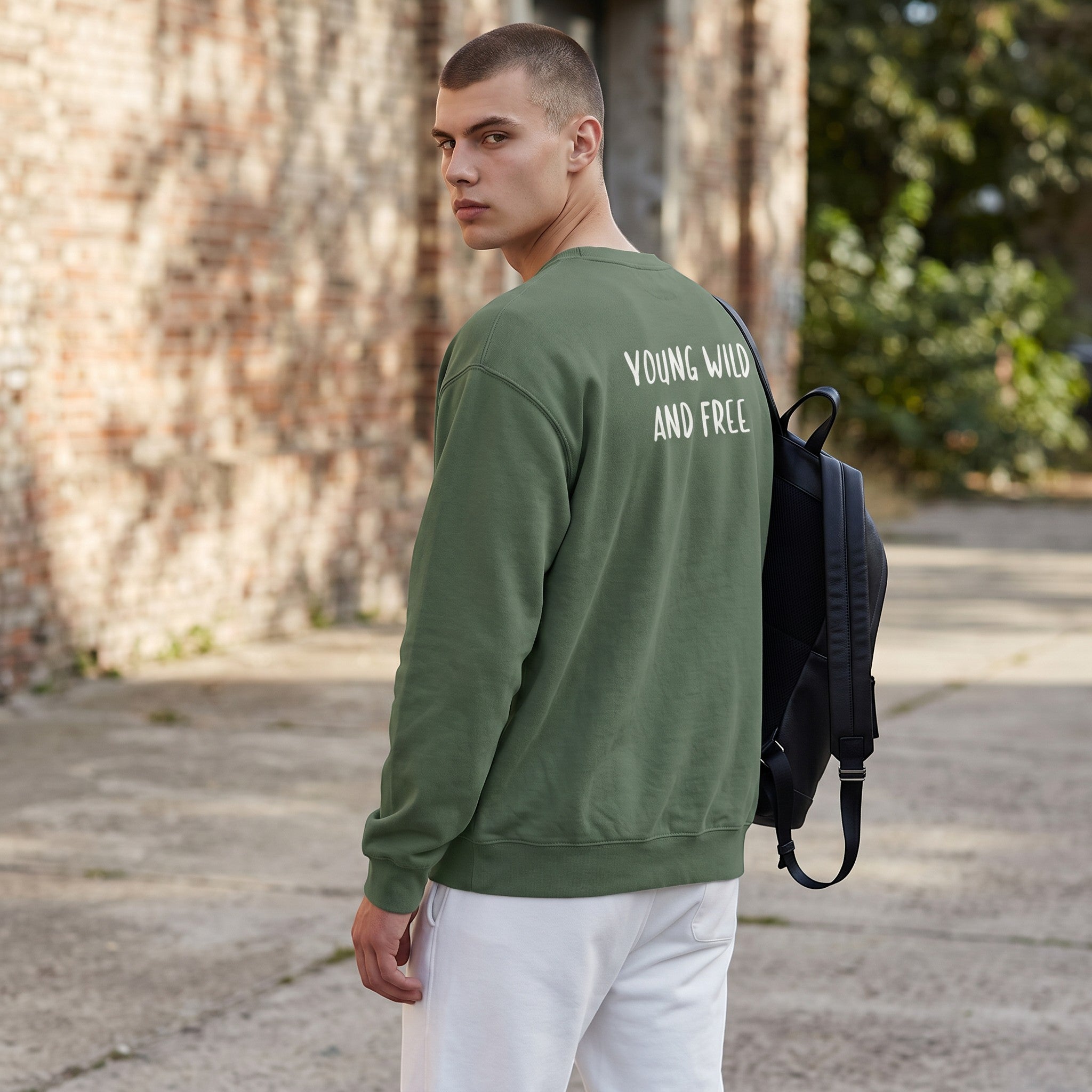 Icy Culture green cotton blend sweatshirt with "Young Wild And Free" text on back. Classic fit.