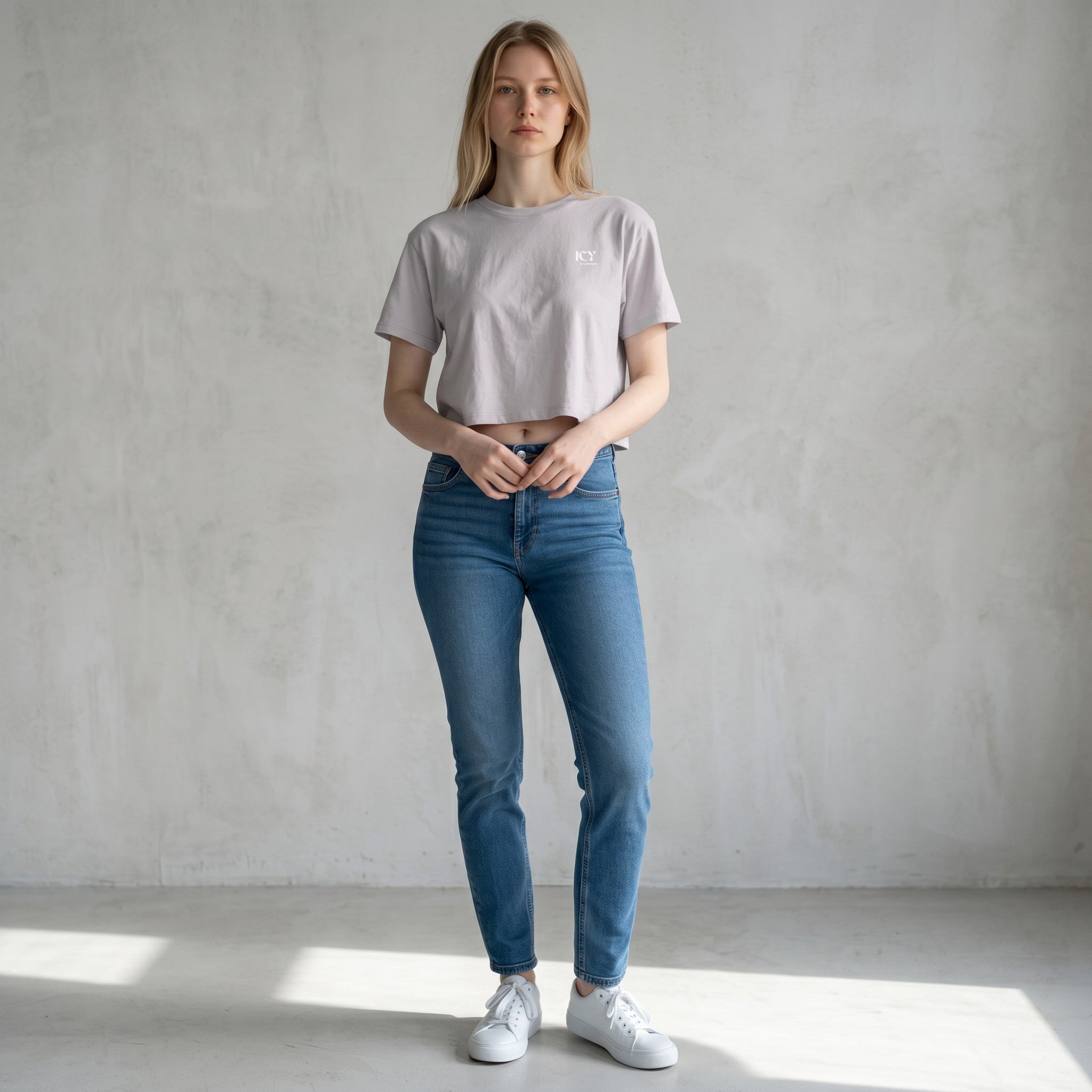 Icy Culture light grey cotton crop tee with short sleeves and a relaxed fit, featuring a small logo on the chest.