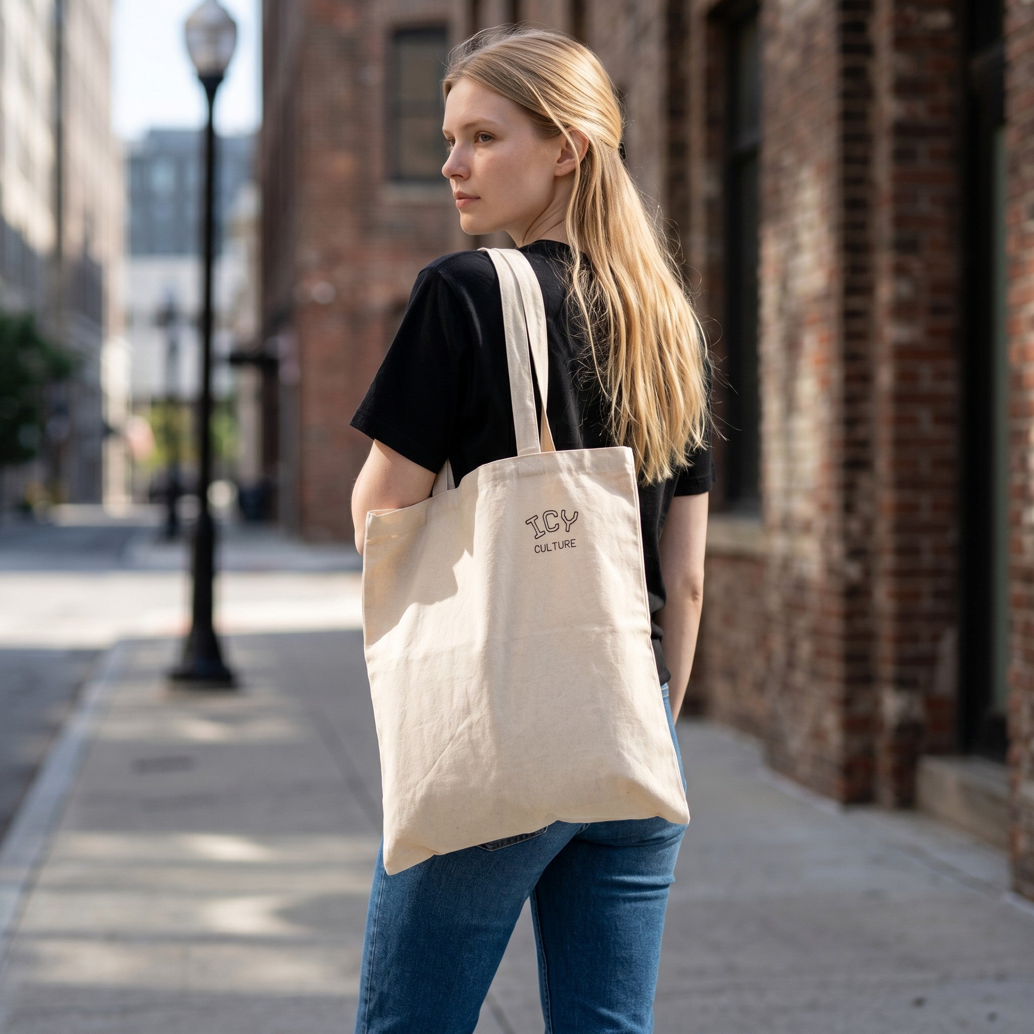 Icy Culture natural cotton canvas tote bag, 15" x 16", with 20" handles and subtle logo.