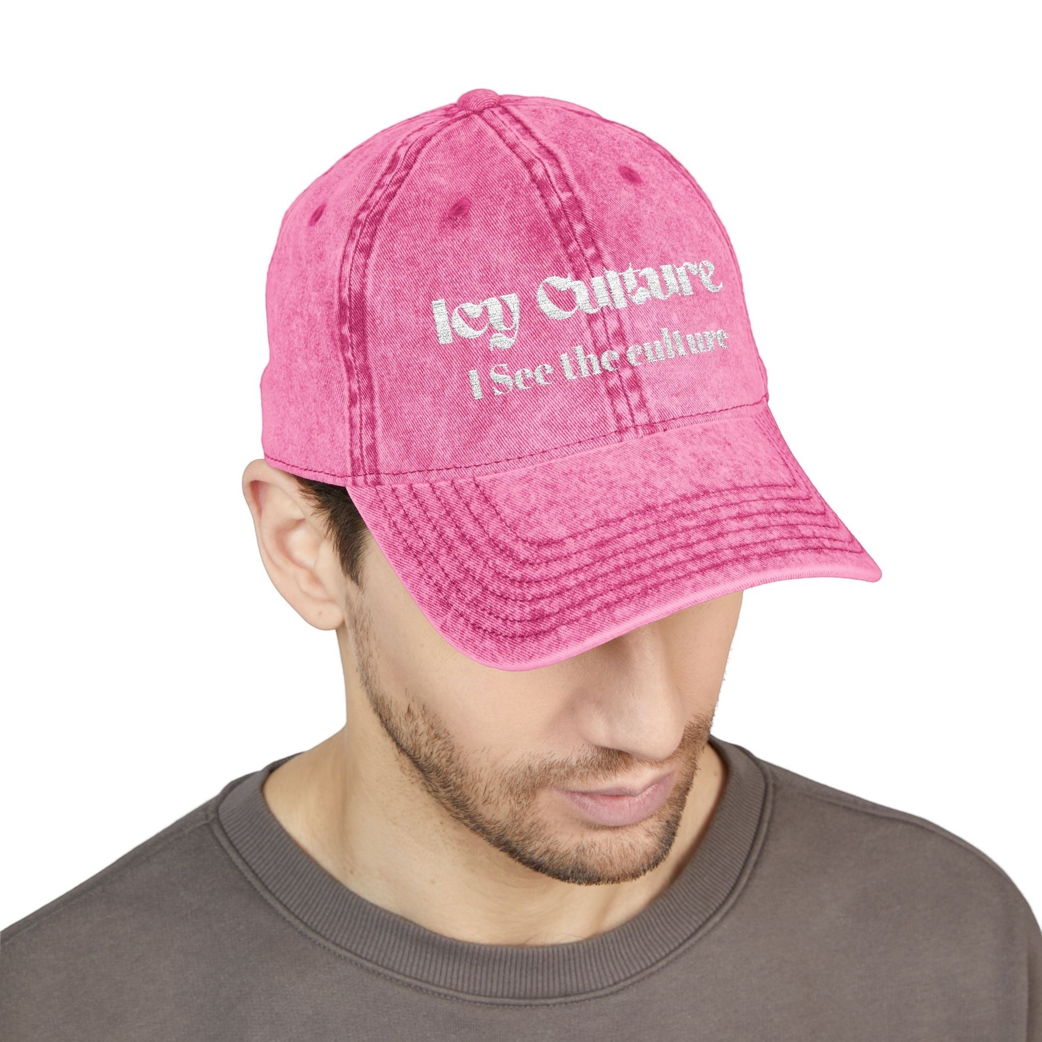 Icy Culture washed-out pink cotton twill baseball cap with embroidered text, adjustable metal buckle.