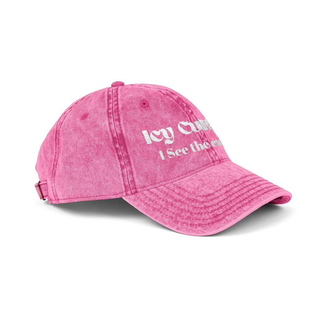 Icy Culture pink washed-out cotton twill baseball cap with embroidered text and adjustable metal buckle.