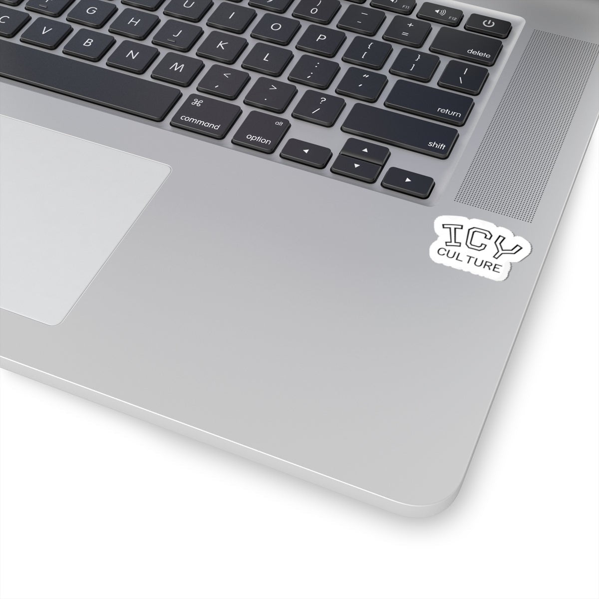 Icy Culture sticker with white border and black outline text, applied to a laptop.