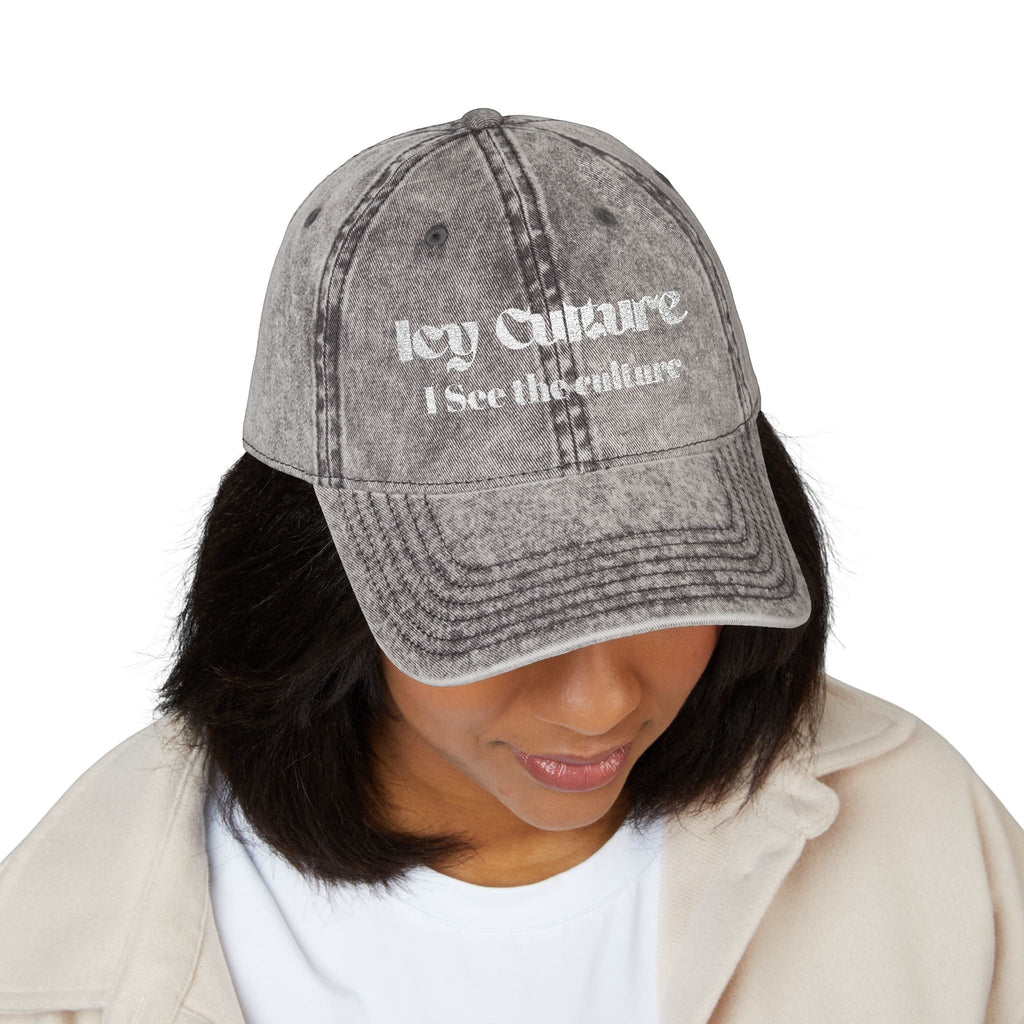 Icy Culture washed-out grey cotton twill baseball cap with embroidered text "I See The Culture" and adjustable brass buckle.