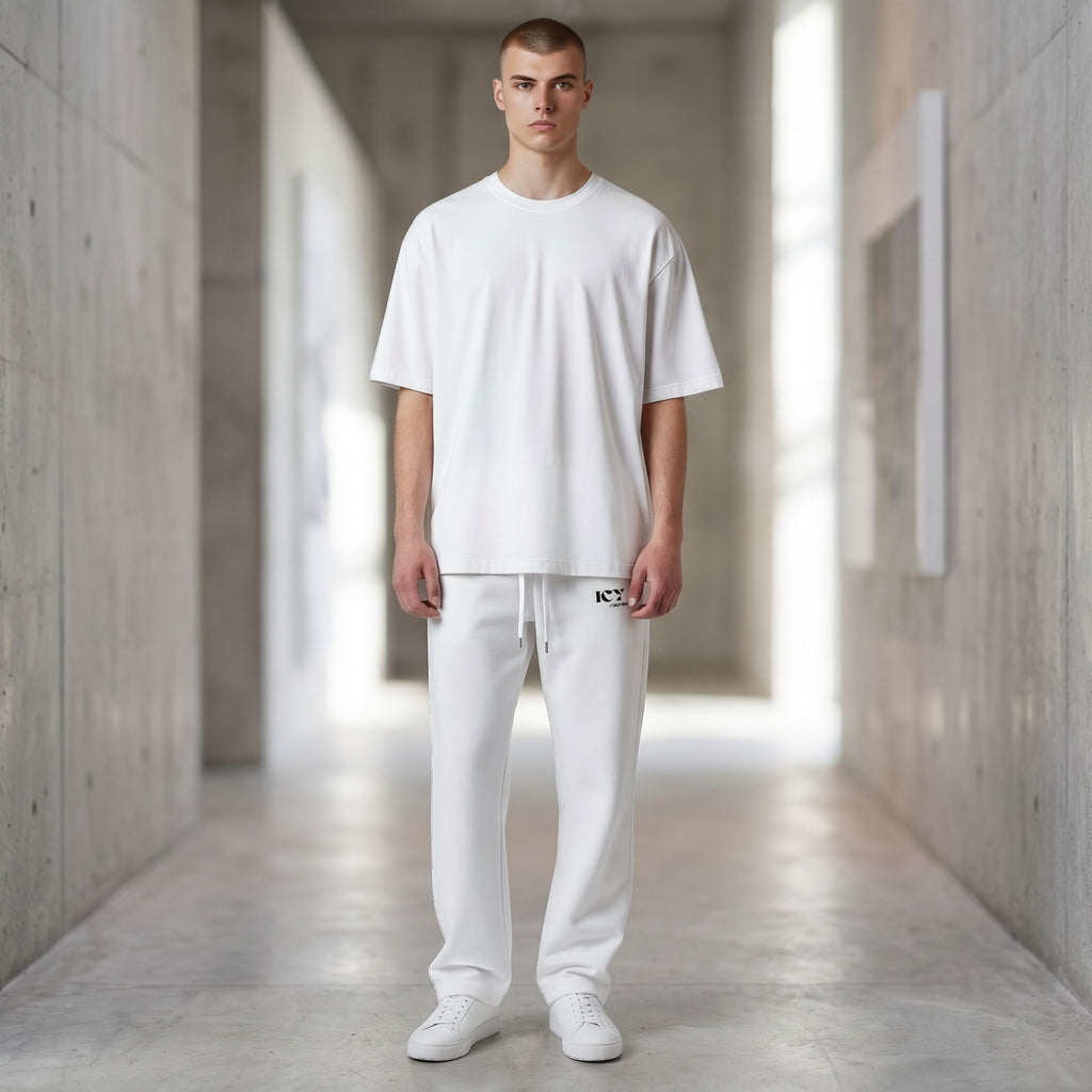 Icy Culture white wide-leg joggers with drawstring and side pockets, made from recycled polyester and elastane.